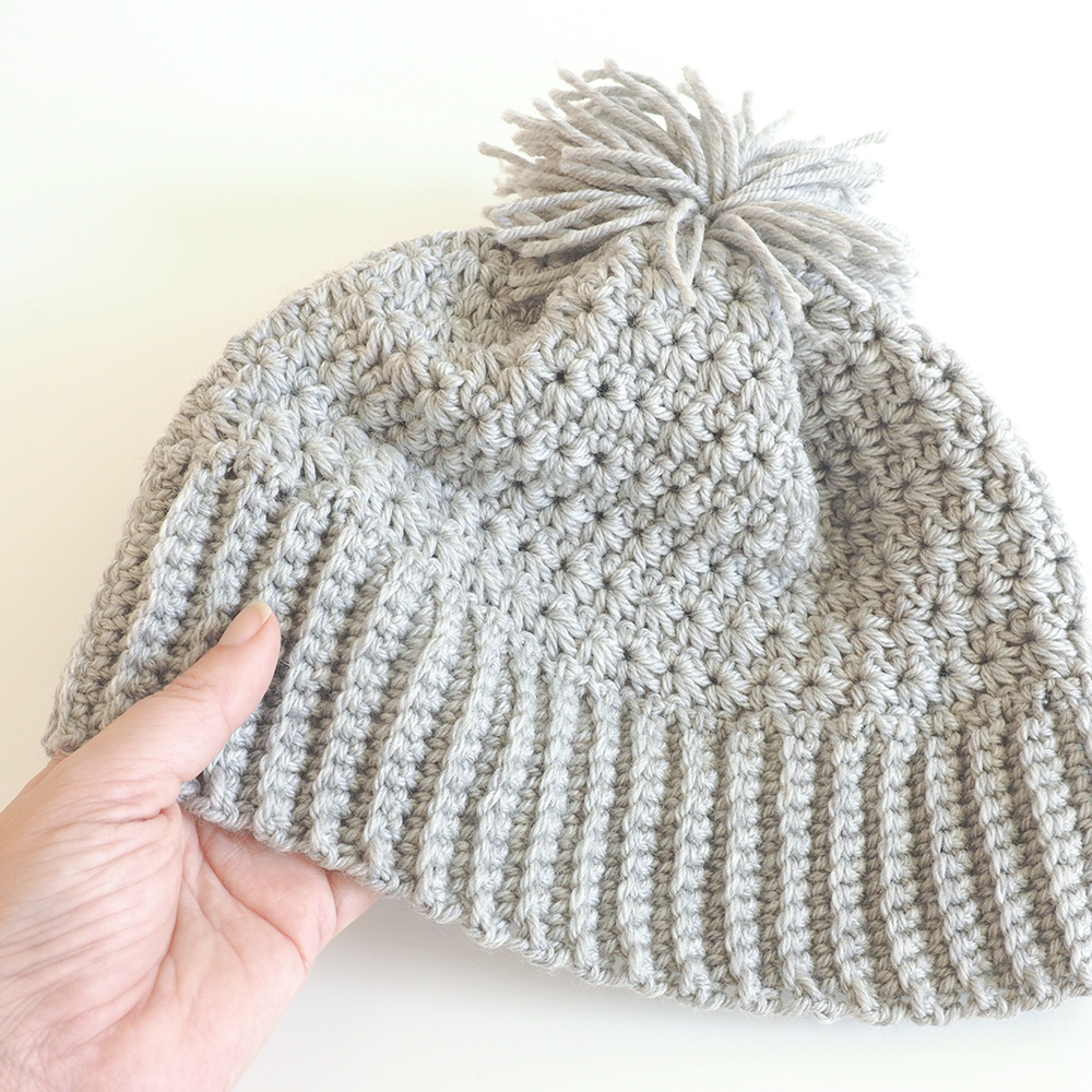 This Beanie Hat is a modern and bold Christmas present for someone challenging to shop for. #crochethat #crochetbeanie #crochetpattern #crochetlove #crochetaddict