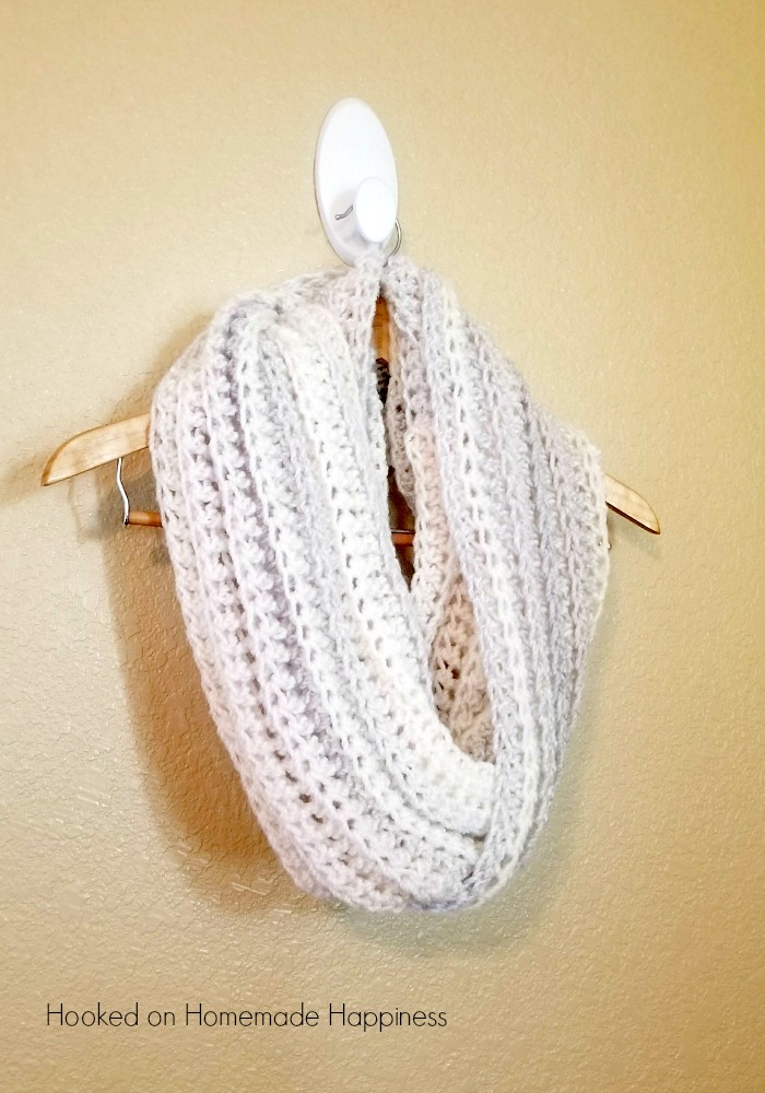 Arctic Infinity Scarft - If you’re just learning how to crochet, a crochet infinity scarf will be your best friend. Take advantage of this and make one for the people you love. #CrochetInfinityScarf #ScarfCrochetPatterns #CrochetPatterns