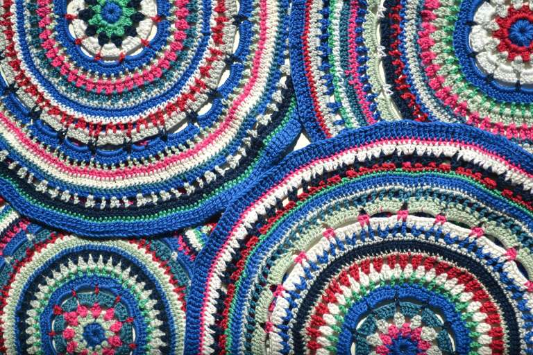 Mandala Placemat - There’s nothing quite like a crochet mandala. These all free crochet patterns are fun and useful for many different purposes. #CrochetMandala #FreeCrochetPattern #CrochetMandalaPattern
