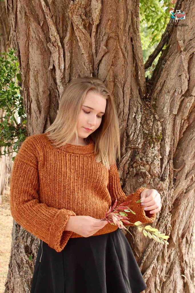Easy Knit-Look Cropped Sweater - These 16 super easy crochet sweater patterns are the best we’ve found. There’s a good variety to choose from whether you like them light, cropped or with a classic look. #easycrochetsweaterpatters #easycrochetpatterns #crochetsweaters