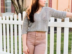 Lightweight Cropped Crochet Sweater - These 16 super easy crochet sweater patterns are the best we’ve found. There’s a good variety to choose from whether you like them light, cropped or with a classic look. #easycrochetsweaterpatters #easycrochetpatterns #crochetsweaters