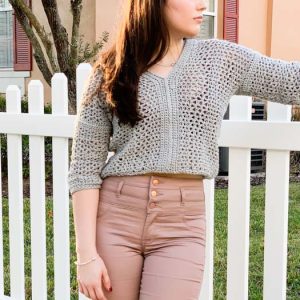 Lightweight Cropped Crochet Sweater - These 16 super easy crochet sweater patterns are the best we’ve found. There’s a good variety to choose from whether you like them light, cropped or with a classic look. #easycrochetsweaterpatters #easycrochetpatterns #crochetsweaters