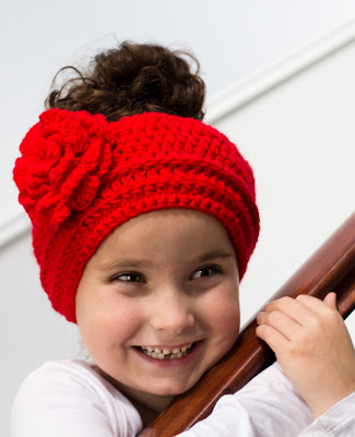 Rosy Red Ear Warmer - Check out these cute, versatile and functional crochet ear warmer patterns and get started on your stock before the cold sets in! #crochetearwarmerpatterns #crochetearwarmers #crochetpatterns