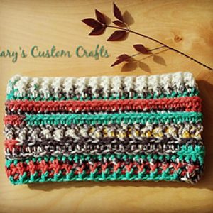 The LJ Ear Warmer - Check out these cute, versatile and functional crochet ear warmer patterns and get started on your stock before the cold sets in! #crochetearwarmerpatterns #crochetearwarmers #crochetpatterns