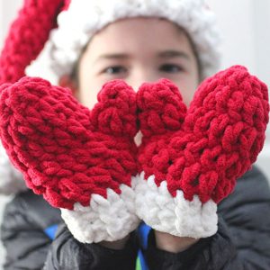 Bernat Blanket Crochet Mittens - These crochet mitten patterns will warm your hands up and keep them ready for use throughout the season. #crochetmittenpatterns #crochepatterns #freecrochepatterns