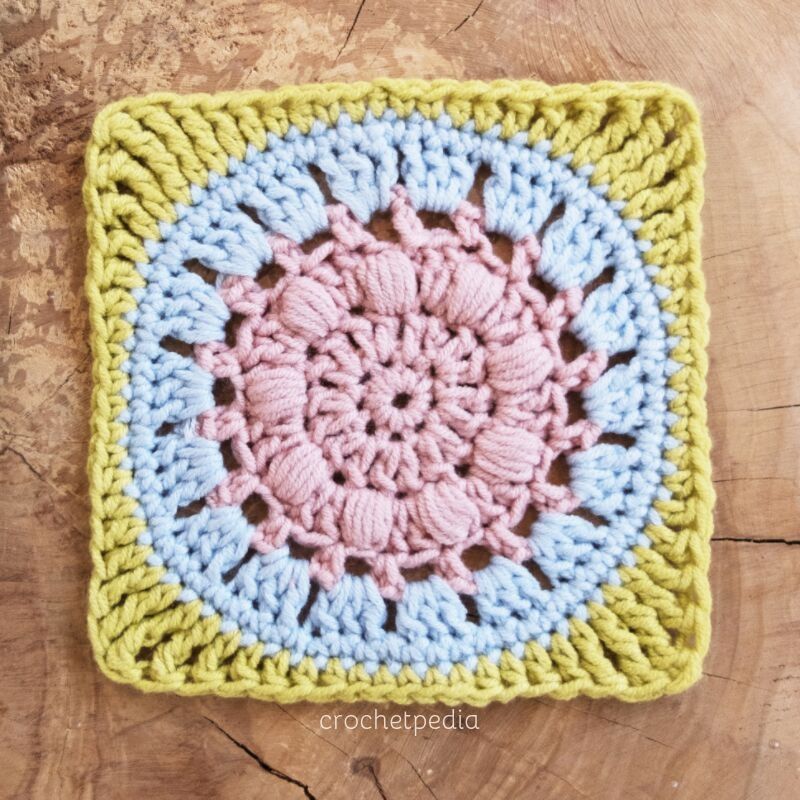 Calm Cove Square - If you’re thinking of starting a crochet blanket and want to give it that extra touch of ‘oomph’ - using any of these crochet squares might be the thing you need! #crochetsquares #afghansquares #crochetpatterns
