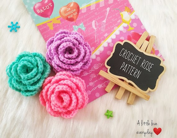 Crochet Roses with a greeting card and tiny wooden sign