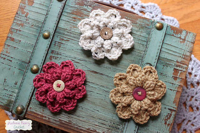 Autumn Berry Crochet Flowers on top of a chest