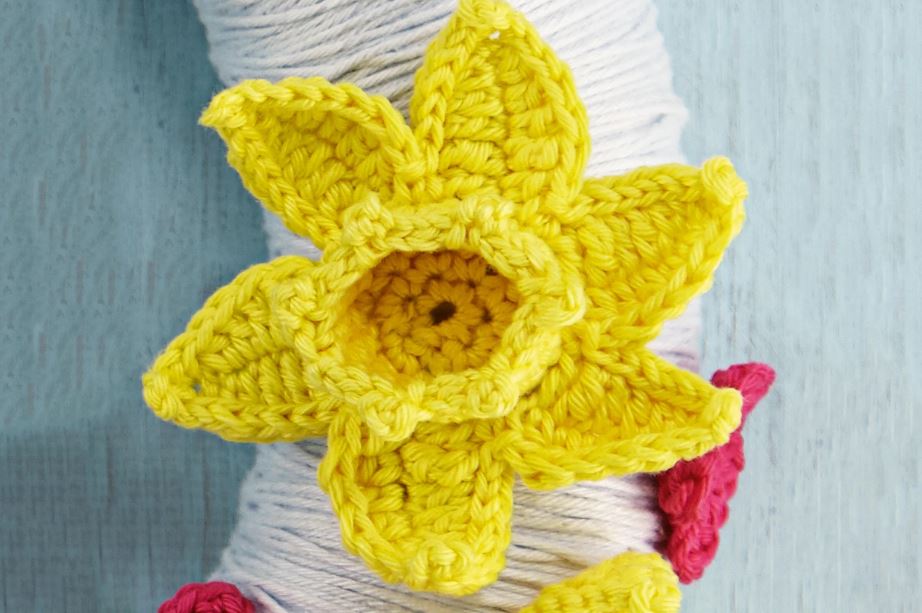 Crochet Daffodil flower attached to a wreath