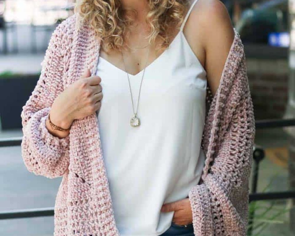 Woman wearing hexagon crochet cardigan sweater